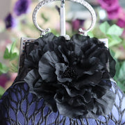 Black Silk Flower and Blue Handbag