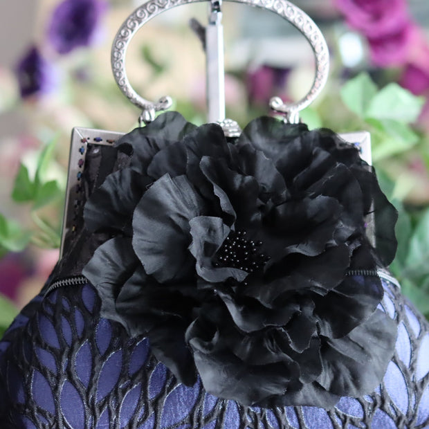 Black Silk Flower and Blue Handbag