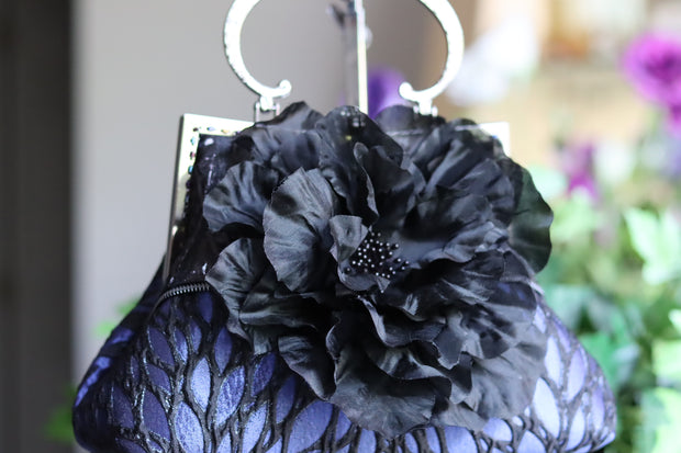 Black Silk Flower and Blue Handbag